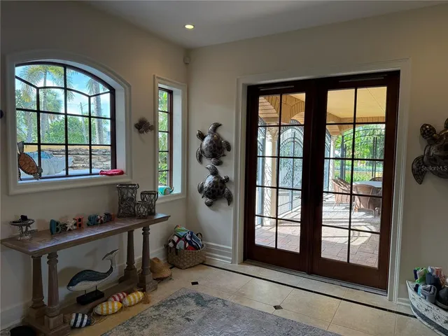 a view of a hallway with stairs