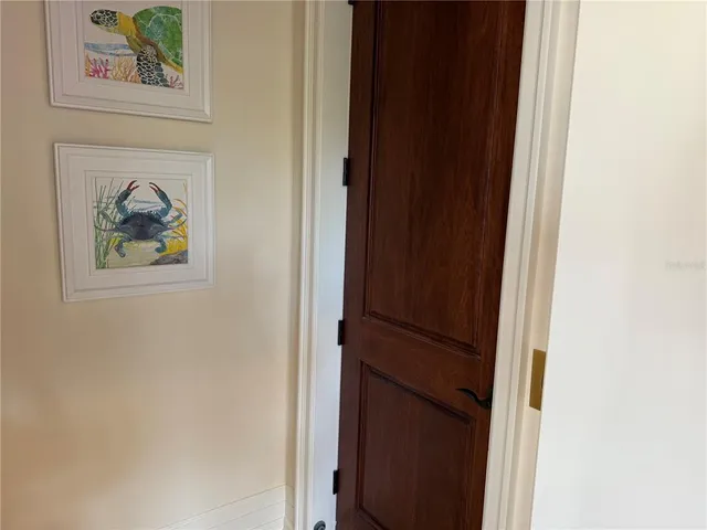 a kitchen with stainless steel appliances kitchen island granite countertop a sink and cabinets