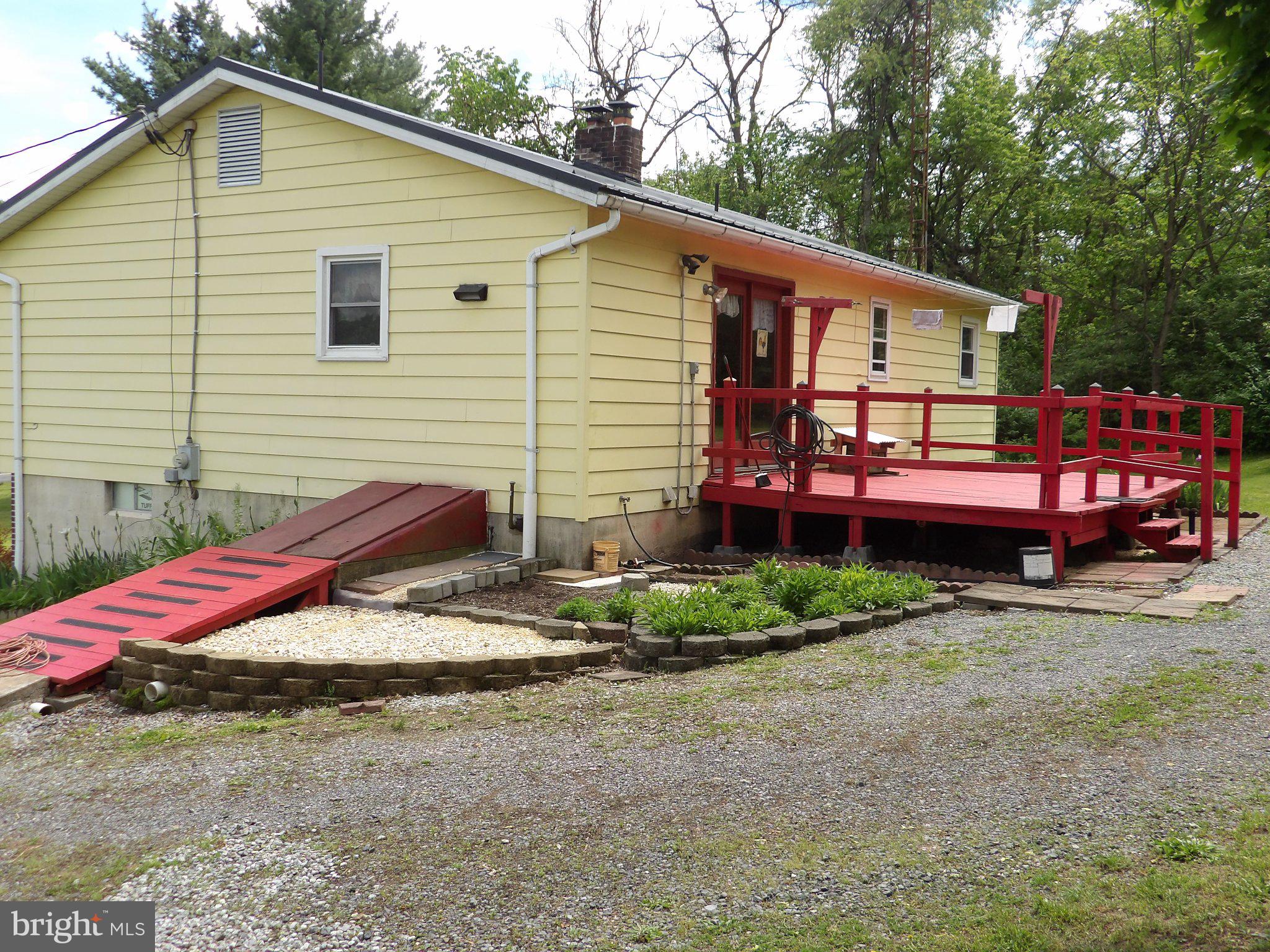 1045 Lockport Road Lewistown, PA 17044 - Photo 22 of 51 Charming yellow home with red accents.