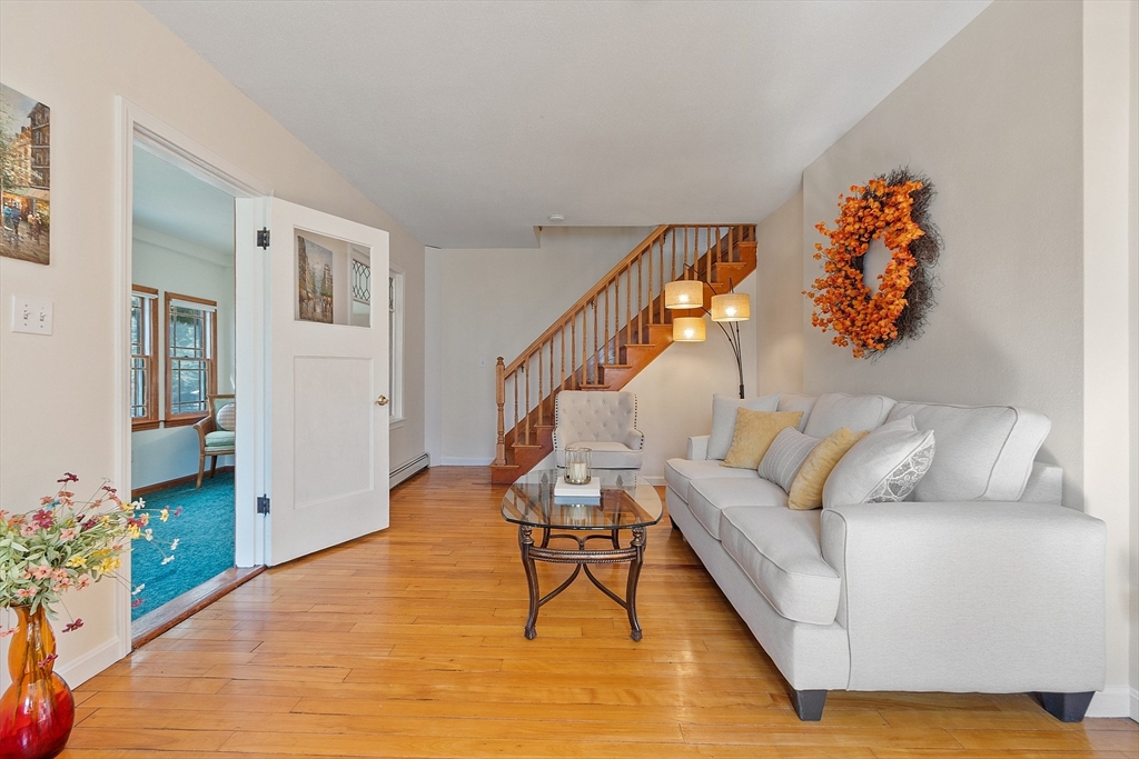 44 Hamlin Street Lunenburg, MA 01462 - Photo 14 of 35 a living room with furniture and wooden floor