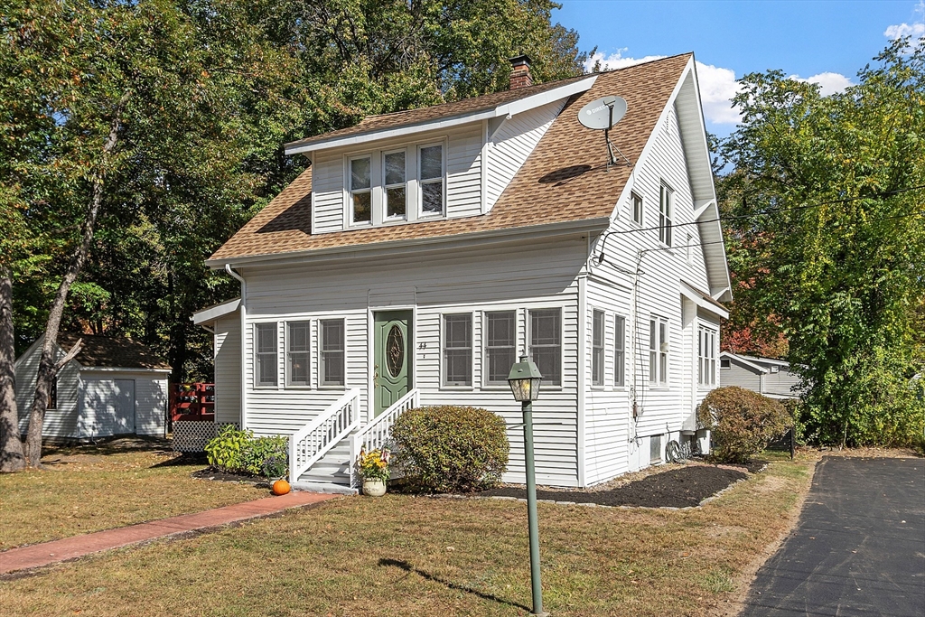 44 Hamlin Street Lunenburg, MA 01462 - Photo 2 of 35 a front view of a house with a yard