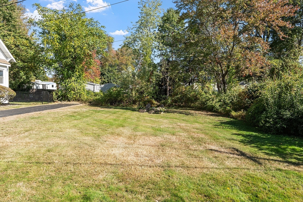 44 Hamlin Street Lunenburg, MA 01462 - Photo 4 of 35 a view of yard with trees