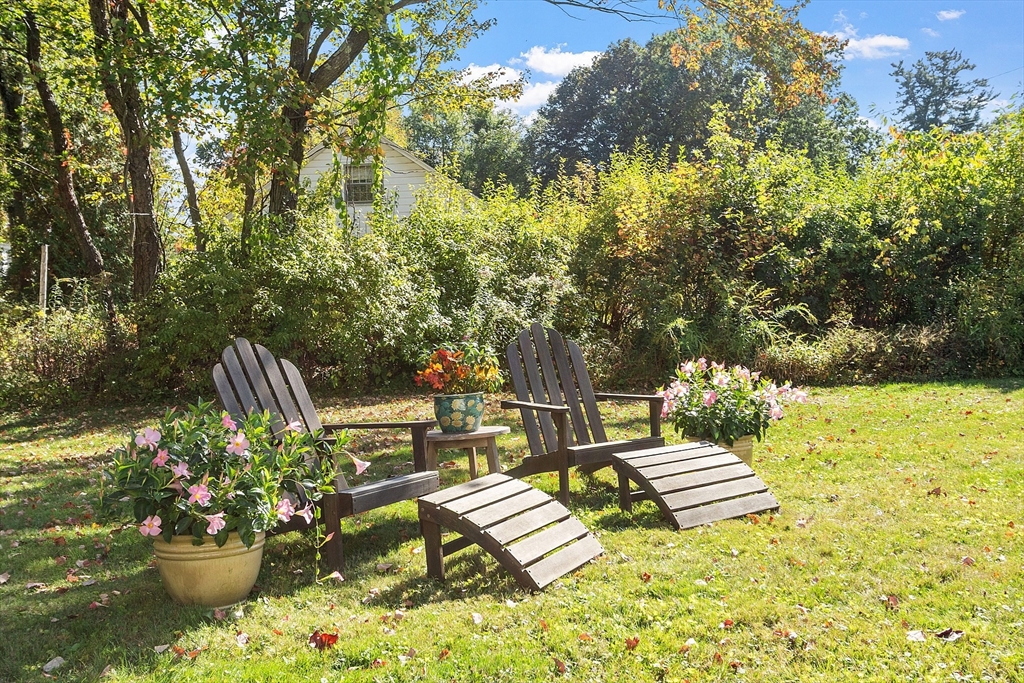 44 Hamlin Street Lunenburg, MA 01462 - Photo 10 of 35 a view of a patio with chairs and plants