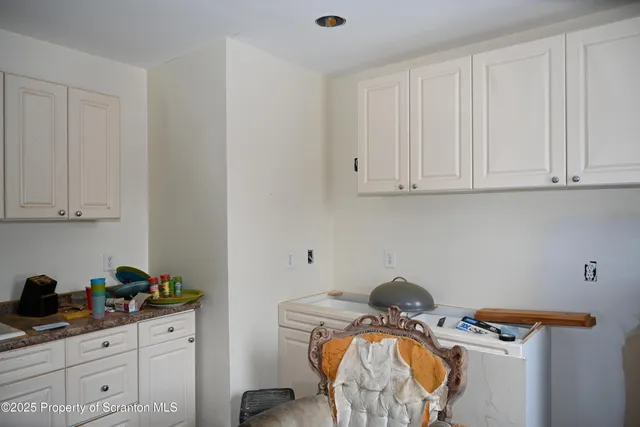 a room with storage and utility