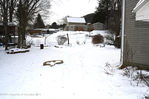 a view of swimming pool with a patio