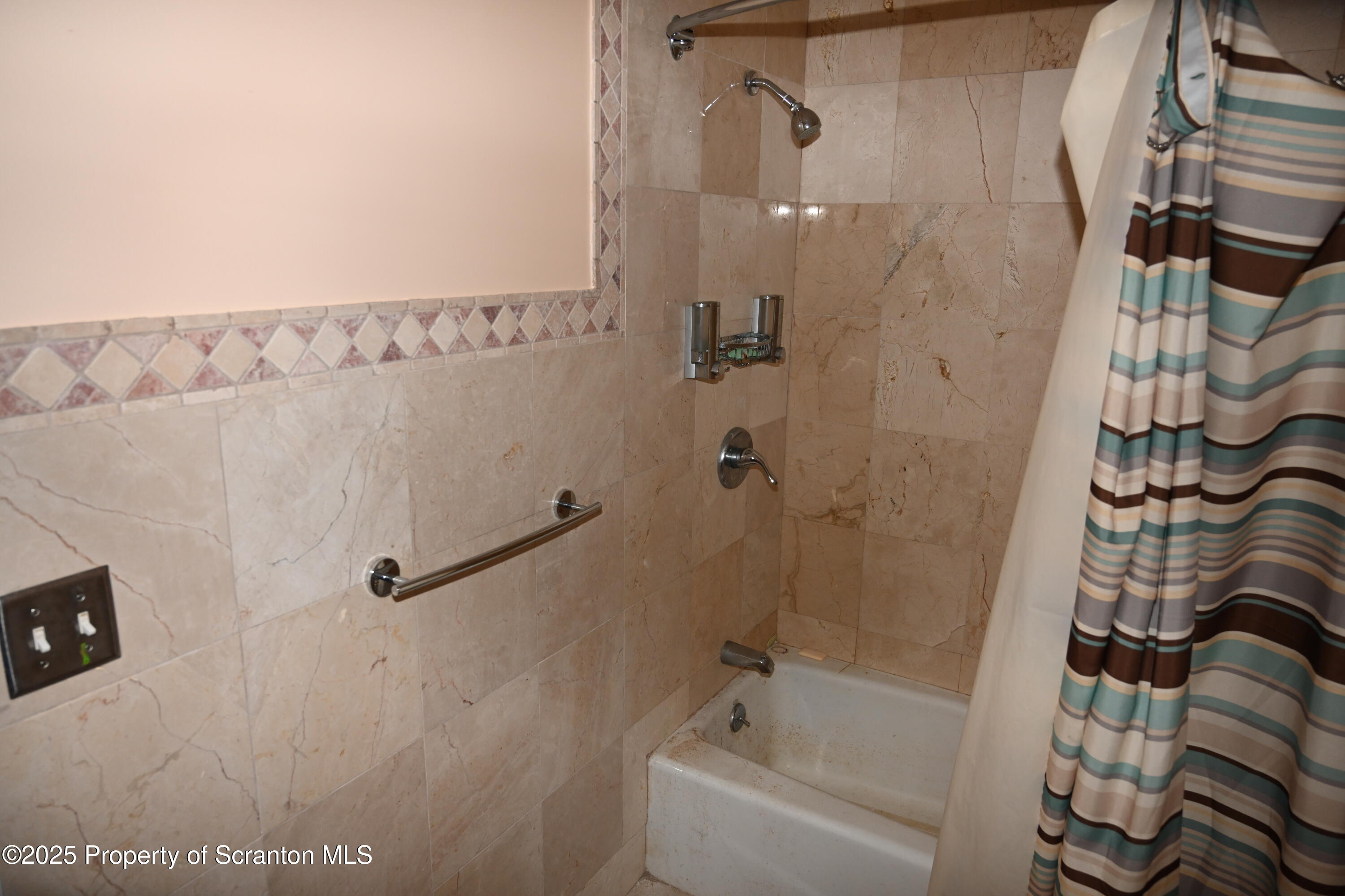 93 Prospect Street Hallstead, PA 18822 - Photo 8 of 32 a bathroom with a bathtub and shower