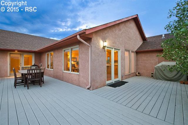 3105 Spaatz Road Monument, CO 80132 - Photo 3 of 18 Spacious composite deck-great for enjoying the views and amazing outdoor dining!!