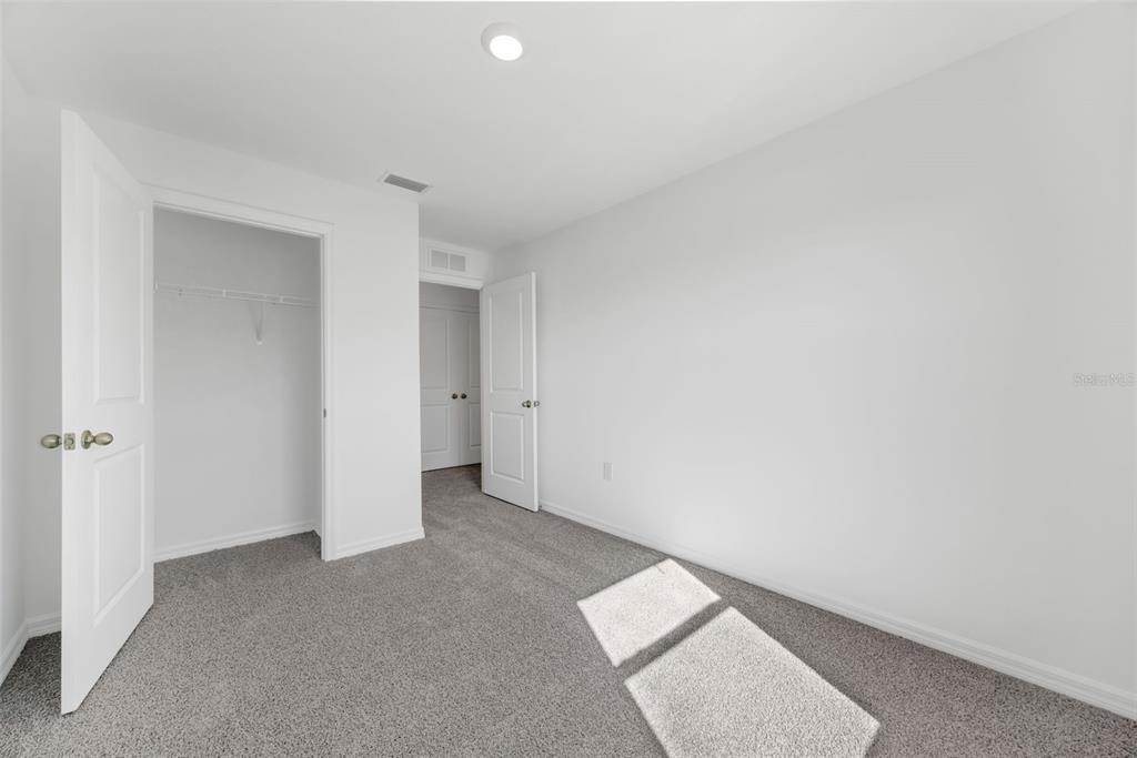 1009 Spotted Egret Loop Ruskin, FL 33570 - Photo 27 of 33 a view of an empty room