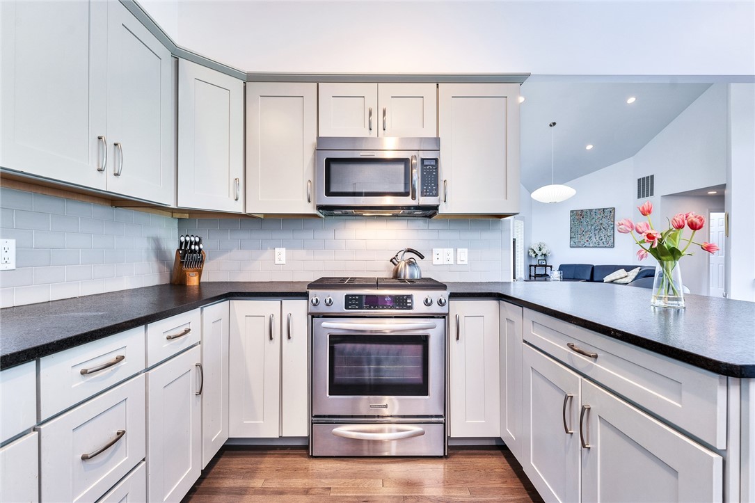 5 Wicklow Road Westerly, RI 02891 - Photo 8 of 37 The kitchen is updated and modern.