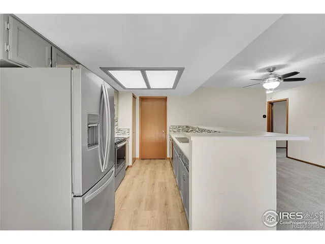 a view of a kitchen with a sink