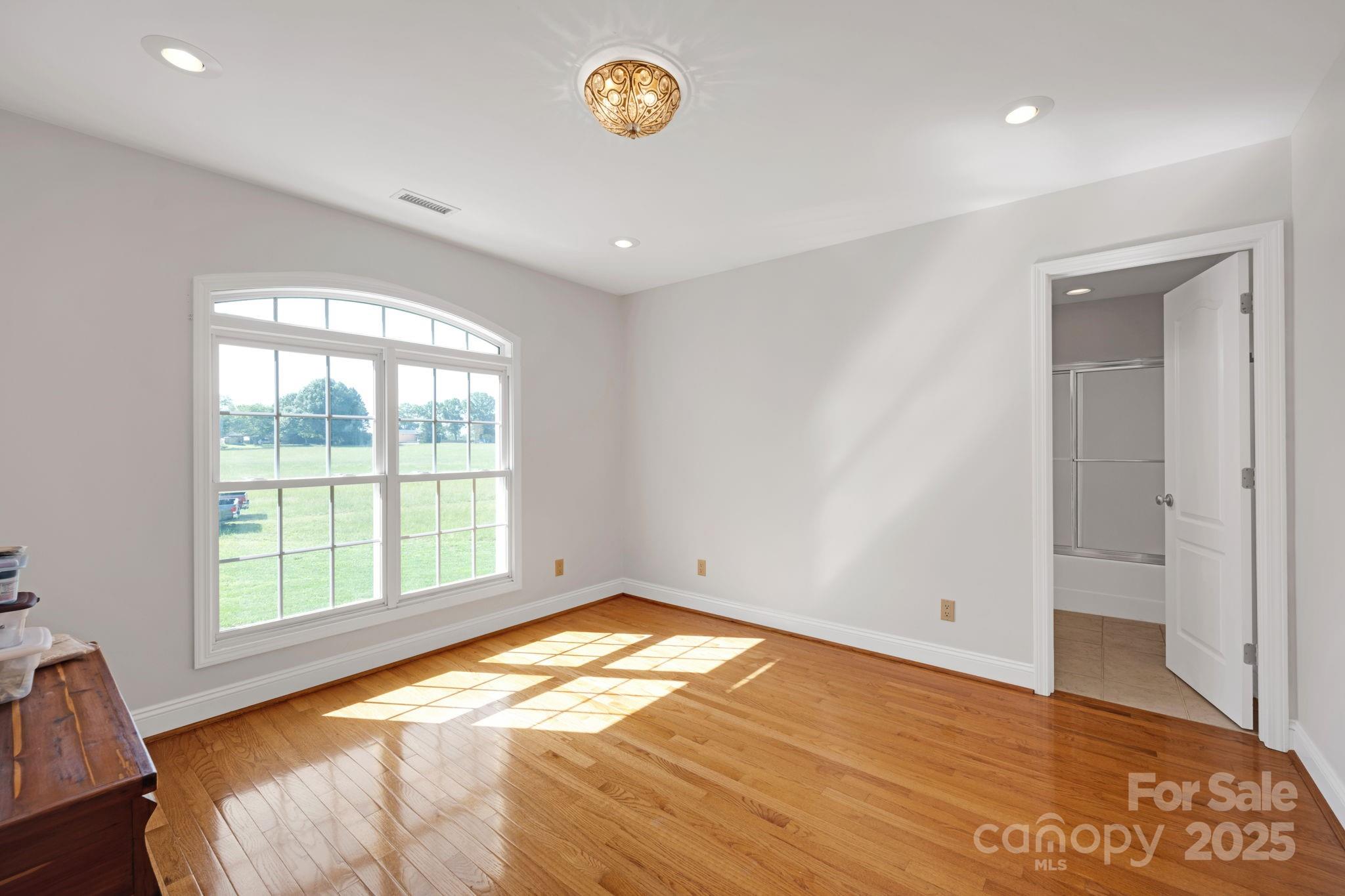 3610 Providence Mill Road Maiden, NC 28650 - Photo 25 of 44 a view of an empty room with a window