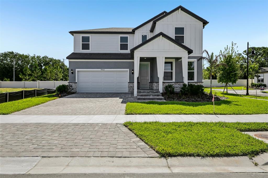 9932 Redwood Rdg Avenue Riverview, FL 33578 - Photo 1 of 38 a front view of a house with a yard