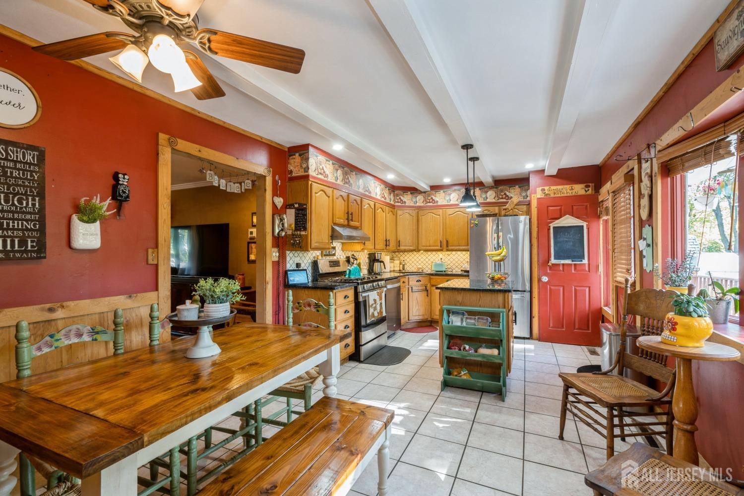 22 Constable Road Kendall Park, NJ 08824 - Photo 25 of 32 a room with lots of table and chairs