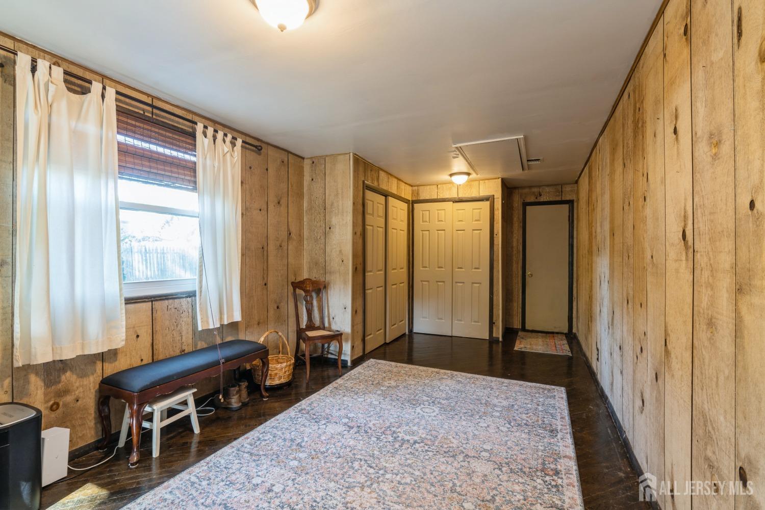 22 Constable Road Kendall Park, NJ 08824 - Photo 31 of 32 a spacious bedroom with a balcony a bed and a window