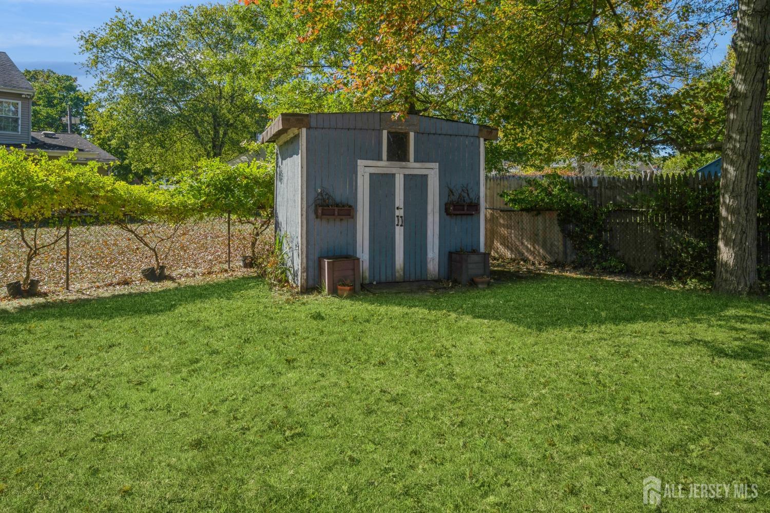 22 Constable Road Kendall Park, NJ 08824 - Photo 9 of 32 a view of a back yard