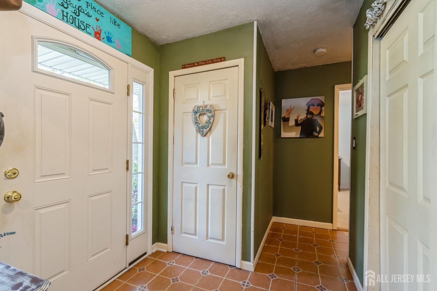 22 Constable Road Kendall Park, NJ 08824 - Photo 10 of 32 a view of a hallway with closet and a window