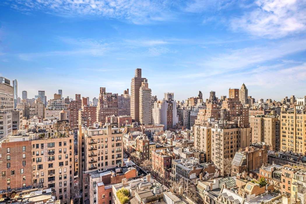 169 East 69th Street, Unit 19A Manhattan, NY 10021 - Photo 11 of 13 a view of a city with tall buildings