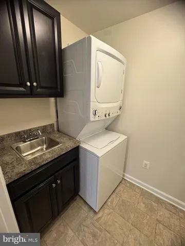 a utility room with two sink
