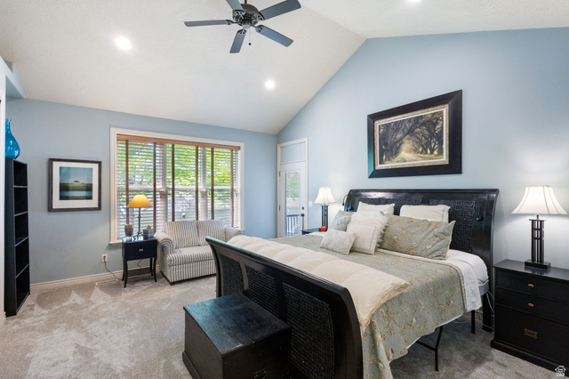 882 Sego Lily Way Mapleton, UT 84664 - Photo 15 of 41 Spacious room featuring a vaulted ceiling with a ceiling fan, recessed lighting, carpet flooring, a large window with blinds, and a built-in bookshelf
