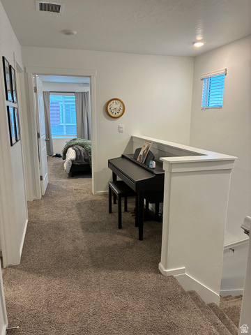 673 West 1920 South, Unit 1063 Provo, UT 84601 - Photo 14 of 15 Carpeted hallway with white walls and trim, recessed lighting, and a window with blinds