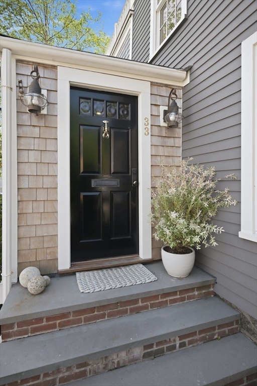 33 Franklin Street Marblehead, MA 01945 - Photo 6 of 42 a view of a house with potted plants