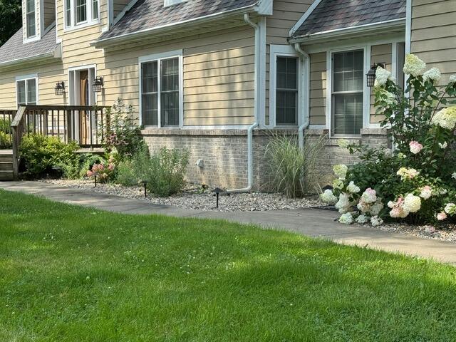2688 North Goldring Road La Porte, IN 46350 - Photo 3 of 42 a front view of a house with a yard and outdoor seating