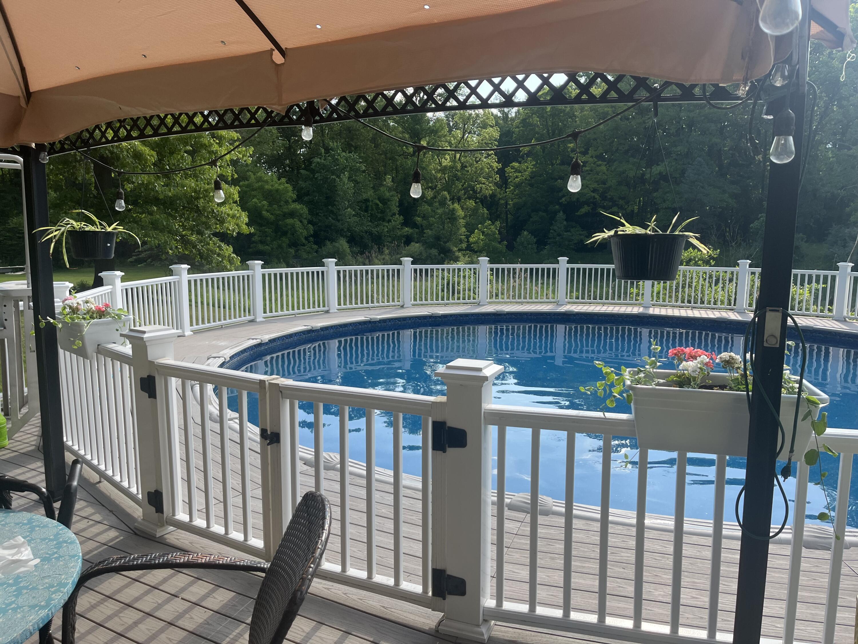 2688 North Goldring Road La Porte, IN 46350 - Photo 37 of 42 a view of a balcony with wooden floor and outdoor seating