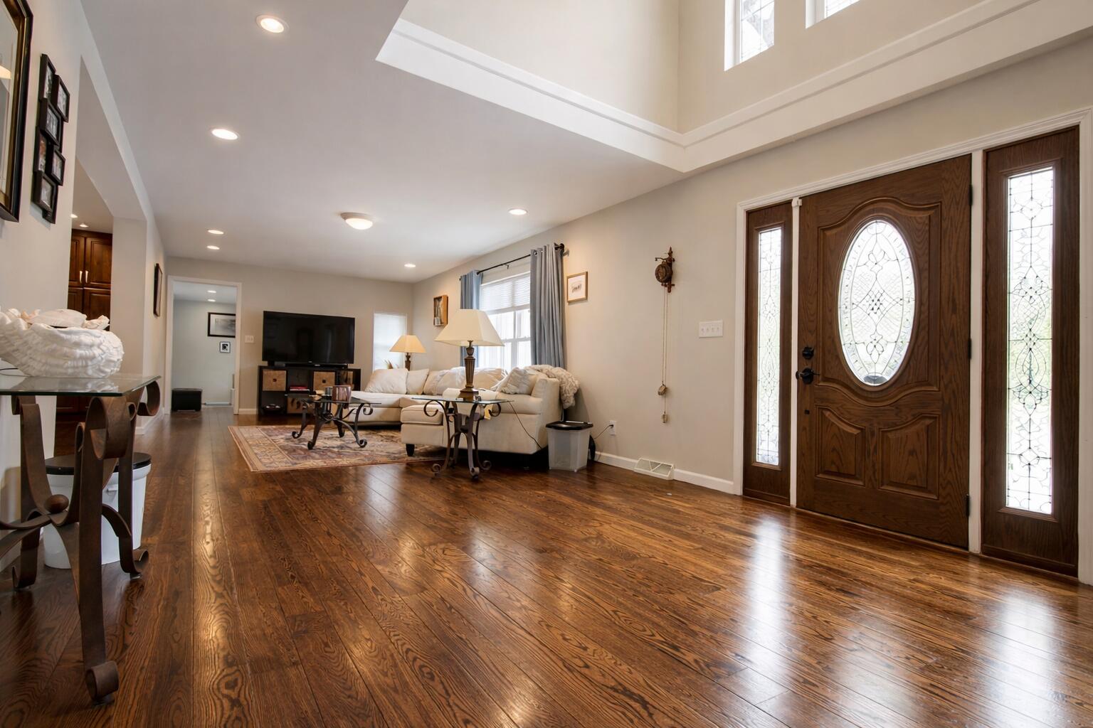 2688 North Goldring Road La Porte, IN 46350 - Photo 10 of 42 a living room with furniture a mirror and a wooden floor