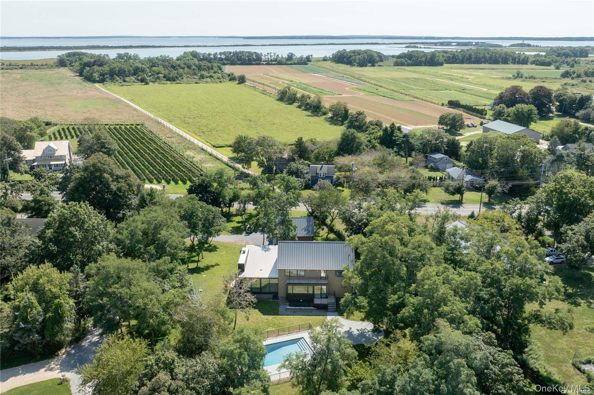 290 Windward Road Orient, NY 11957 - Photo 29 of 31 an aerial view of a house with a lake view