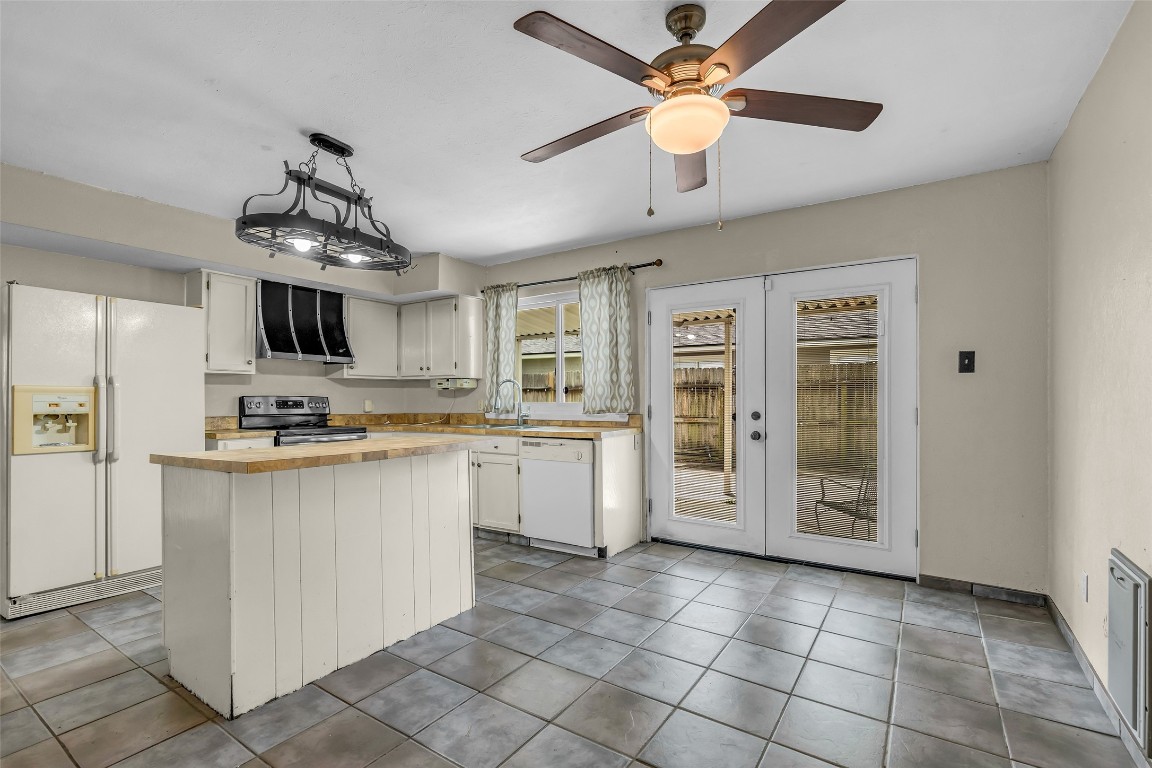 17031 Seven Pines Drive Spring, TX 77379 - Photo 14 of 28 Open Kitchen and Dining area with Easy Access to the Covered Patio. Double Doors were recently upgraded by Renewal by Anderson.