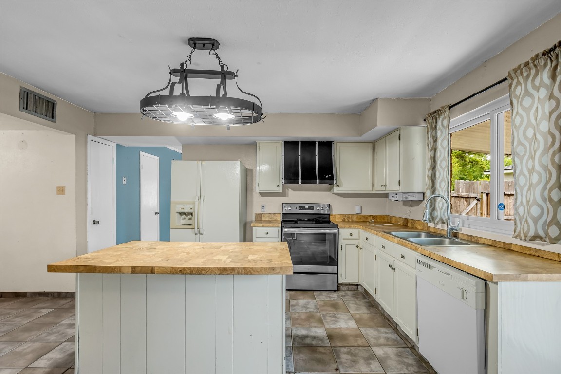 17031 Seven Pines Drive Spring, TX 77379 - Photo 17 of 28 Refrigerator included. Oven Range Recently upgraded. Stainless Steel Double Sink.