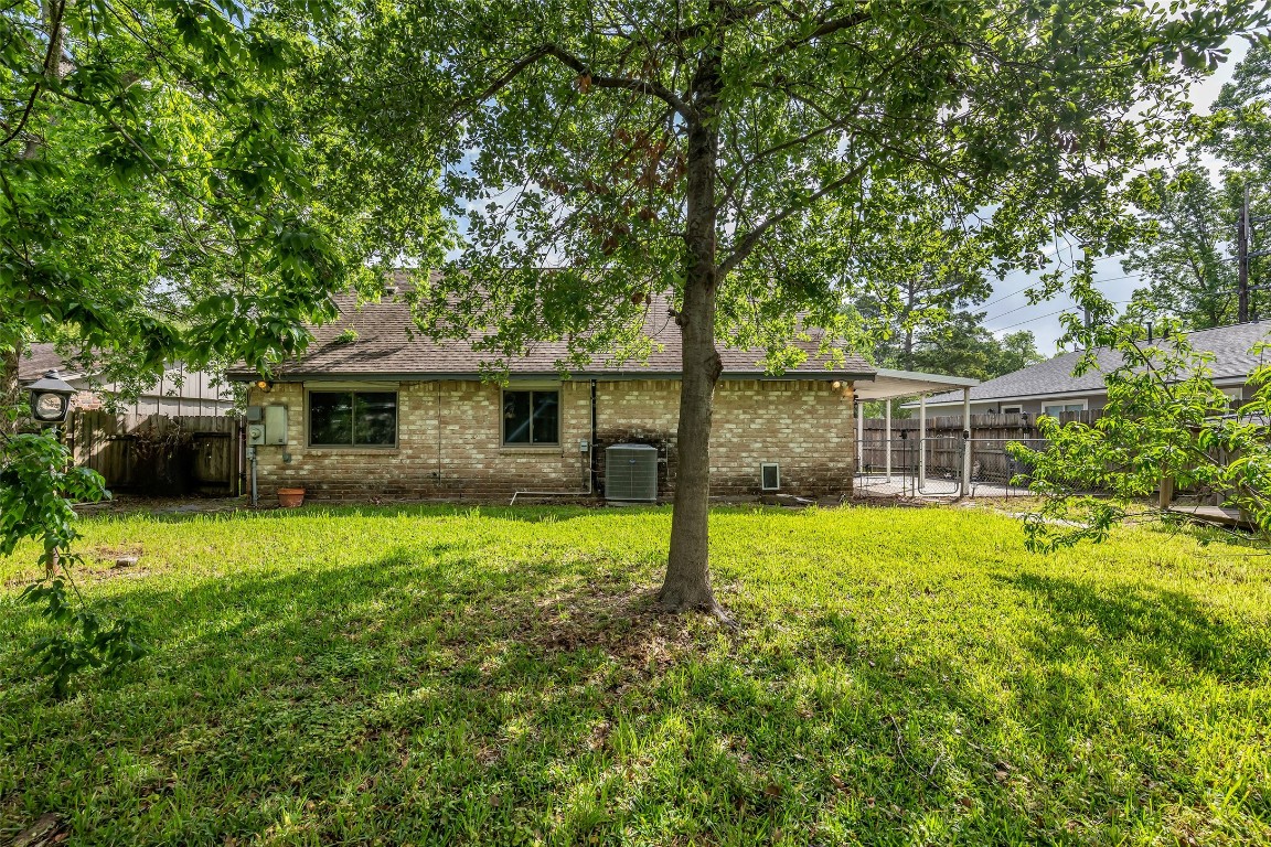 17031 Seven Pines Drive Spring, TX 77379 - Photo 28 of 28 Spacious backyard is fully fenced.