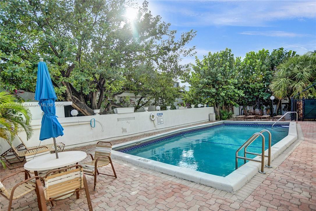 2900 Banyan Street, Unit 408 Fort Lauderdale, FL 33316 - Photo 23 of 29 a view of a backyard with swimming pool
