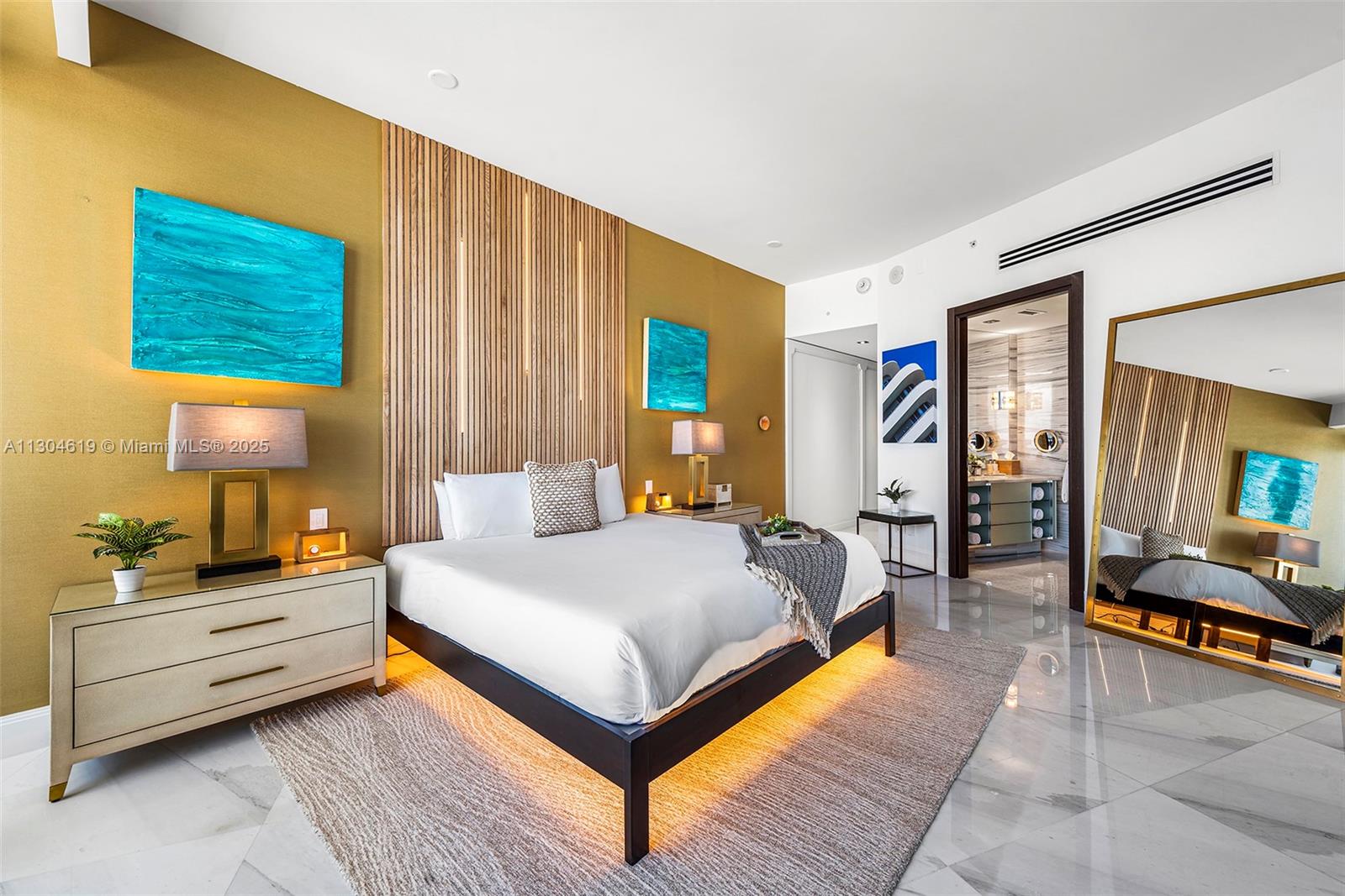 2201 Collins Avenue, Unit 1926/PH Miami Beach, FL 33139 - Photo 18 of 47 a bedroom with a bed and window