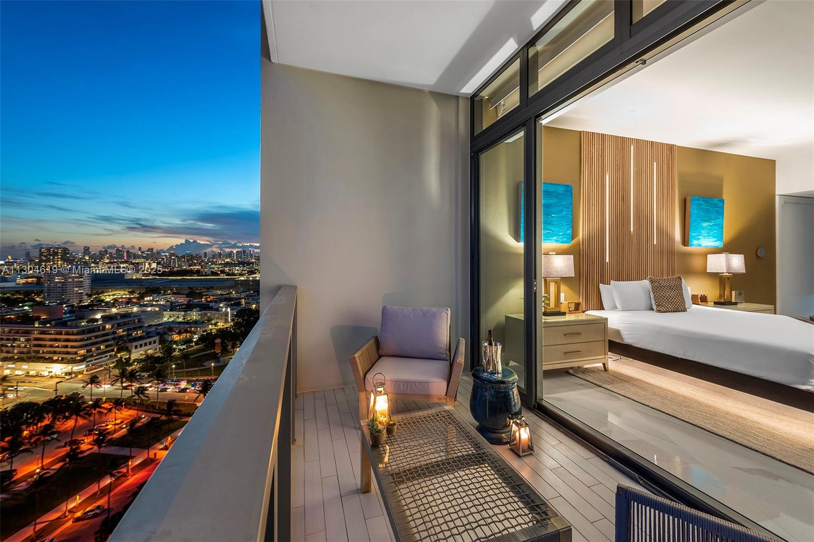 2201 Collins Avenue, Unit 1926/PH Miami Beach, FL 33139 - Photo 24 of 47 a view of a balcony with wooden floor