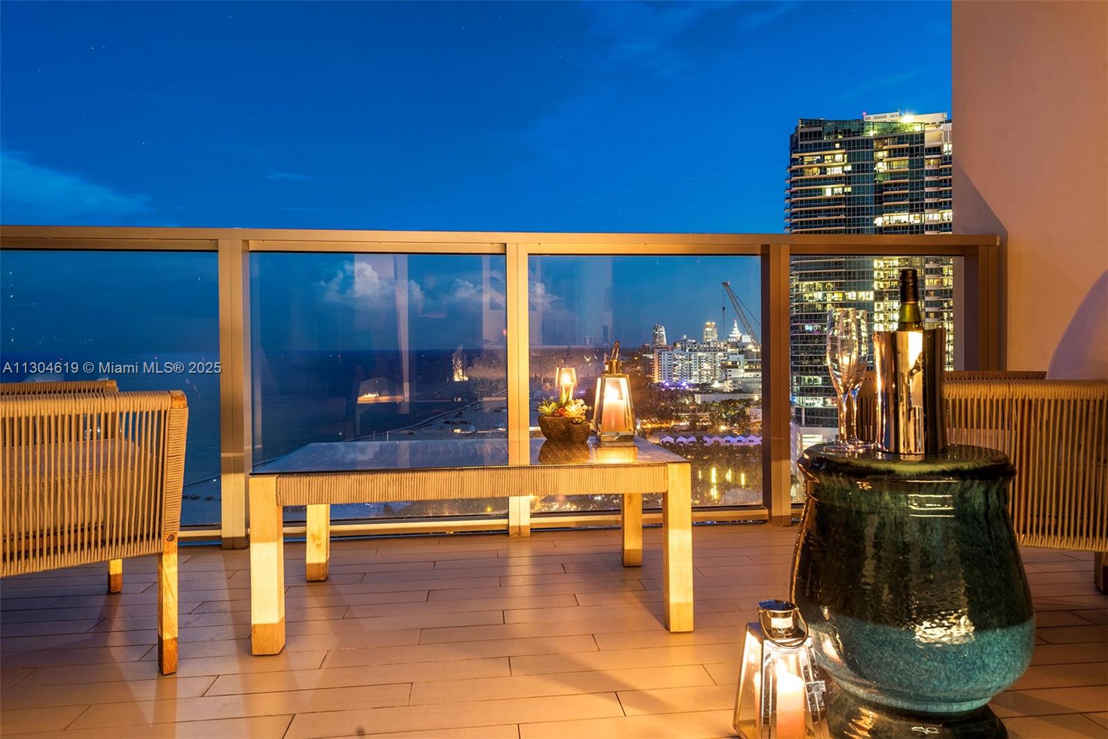 2201 Collins Avenue, Unit 1926/PH Miami Beach, FL 33139 - Photo 27 of 47 a hallway with a view of living room with furniture