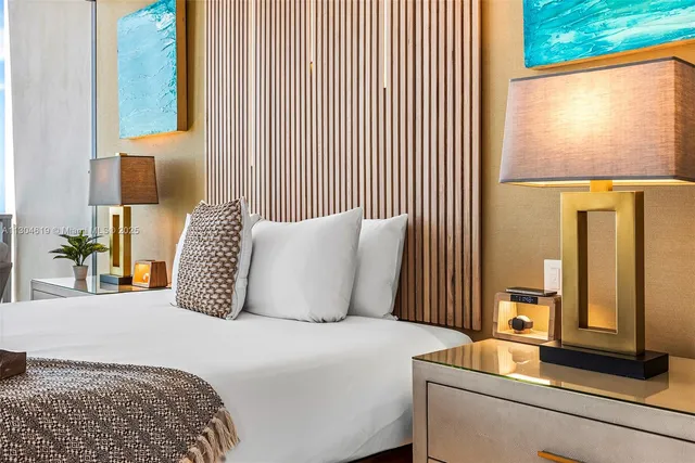 a bathroom with a sink double vanity and a mirror