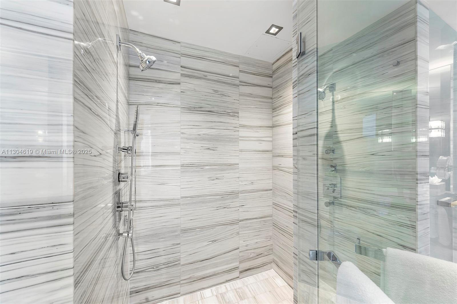 2201 Collins Avenue, Unit 1926/PH Miami Beach, FL 33139 - Photo 46 of 47 a bathroom with a shower