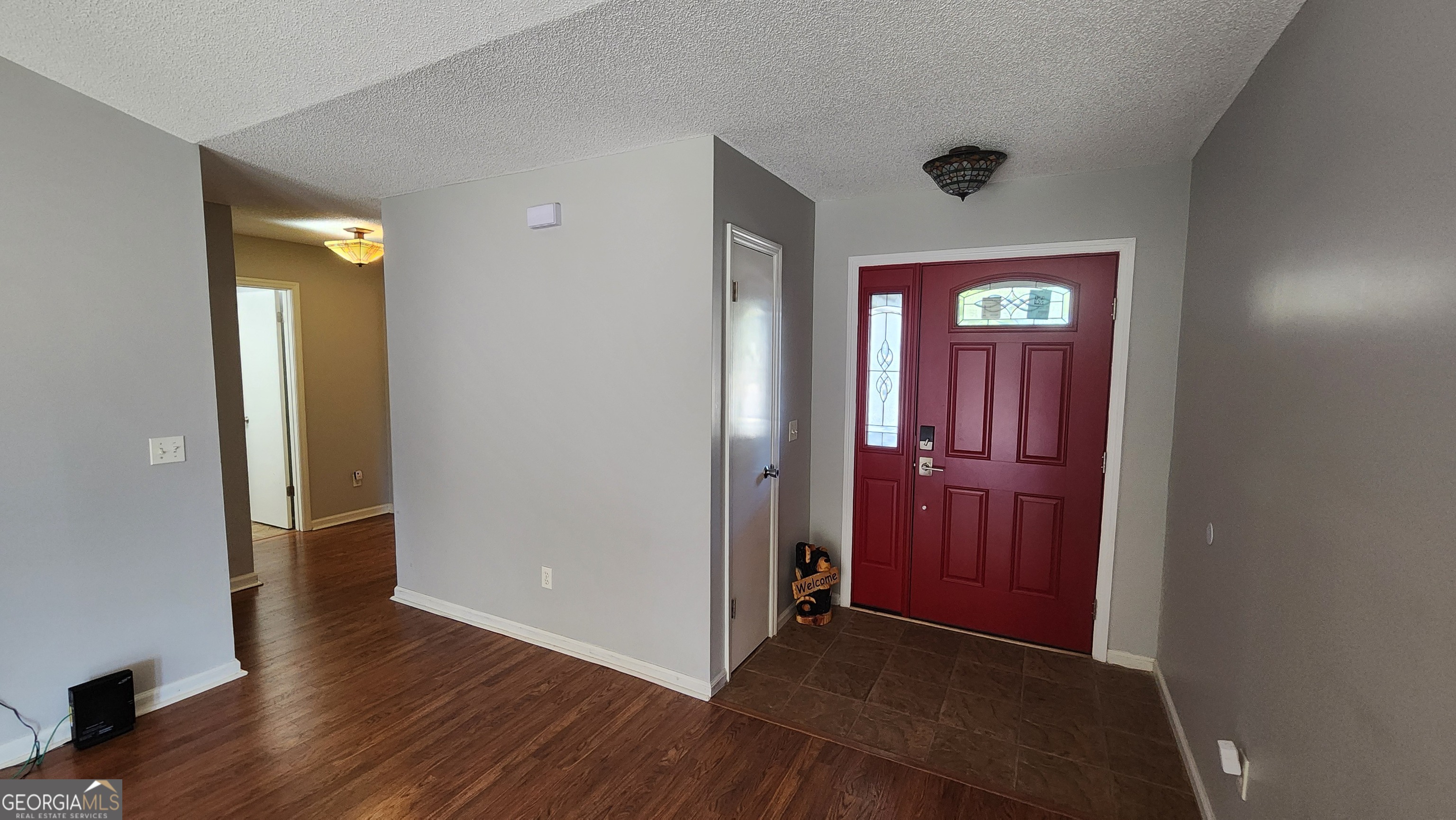 113 Almond Circle Kingsland, GA 31548 - Photo 14 of 34 a view of hallway with wooden floor