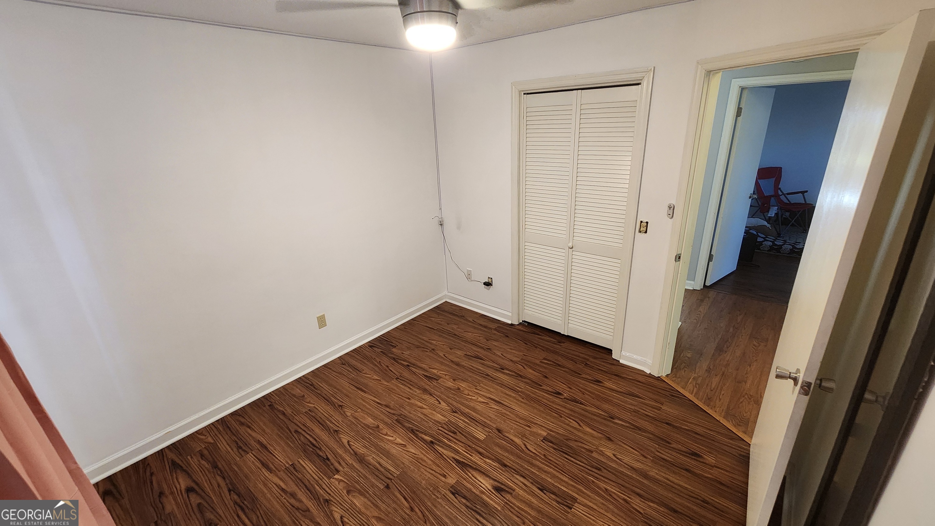 113 Almond Circle Kingsland, GA 31548 - Photo 25 of 34 a view of a room with wooden floor and staircase