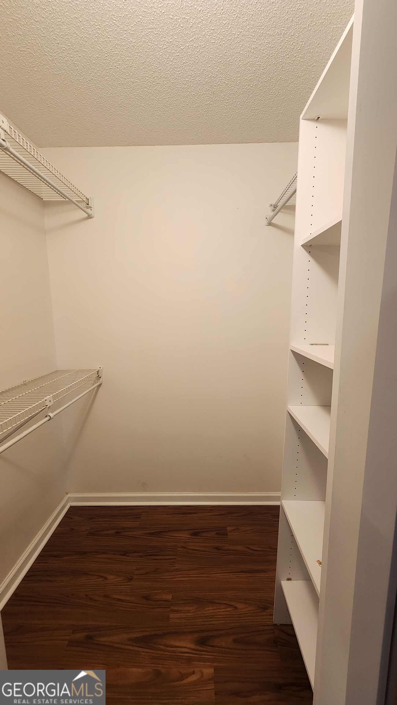 113 Almond Circle Kingsland, GA 31548 - Photo 33 of 34 a view of an empty walk in closet