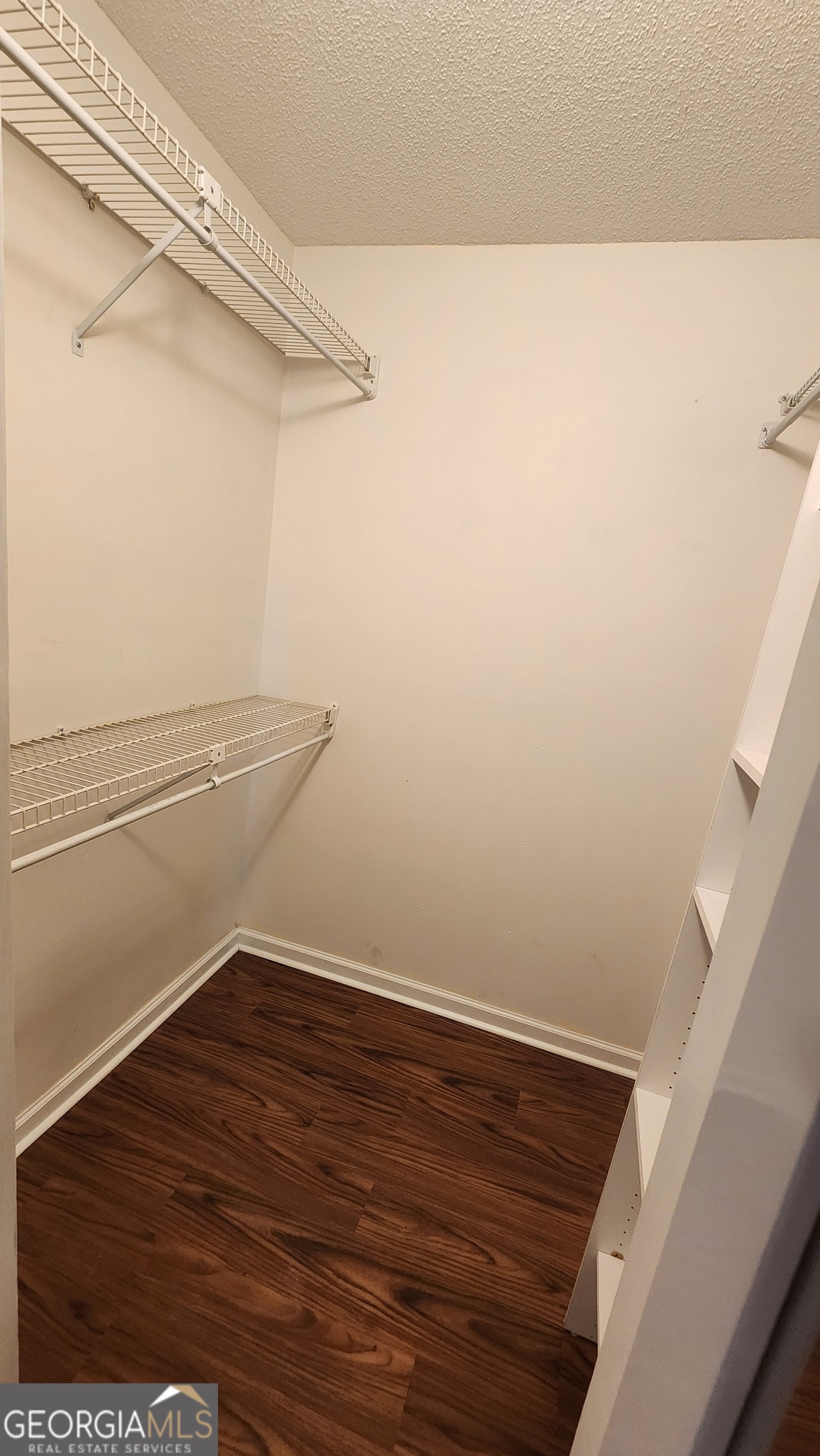 113 Almond Circle Kingsland, GA 31548 - Photo 34 of 34 a view of small space with racks on the wall