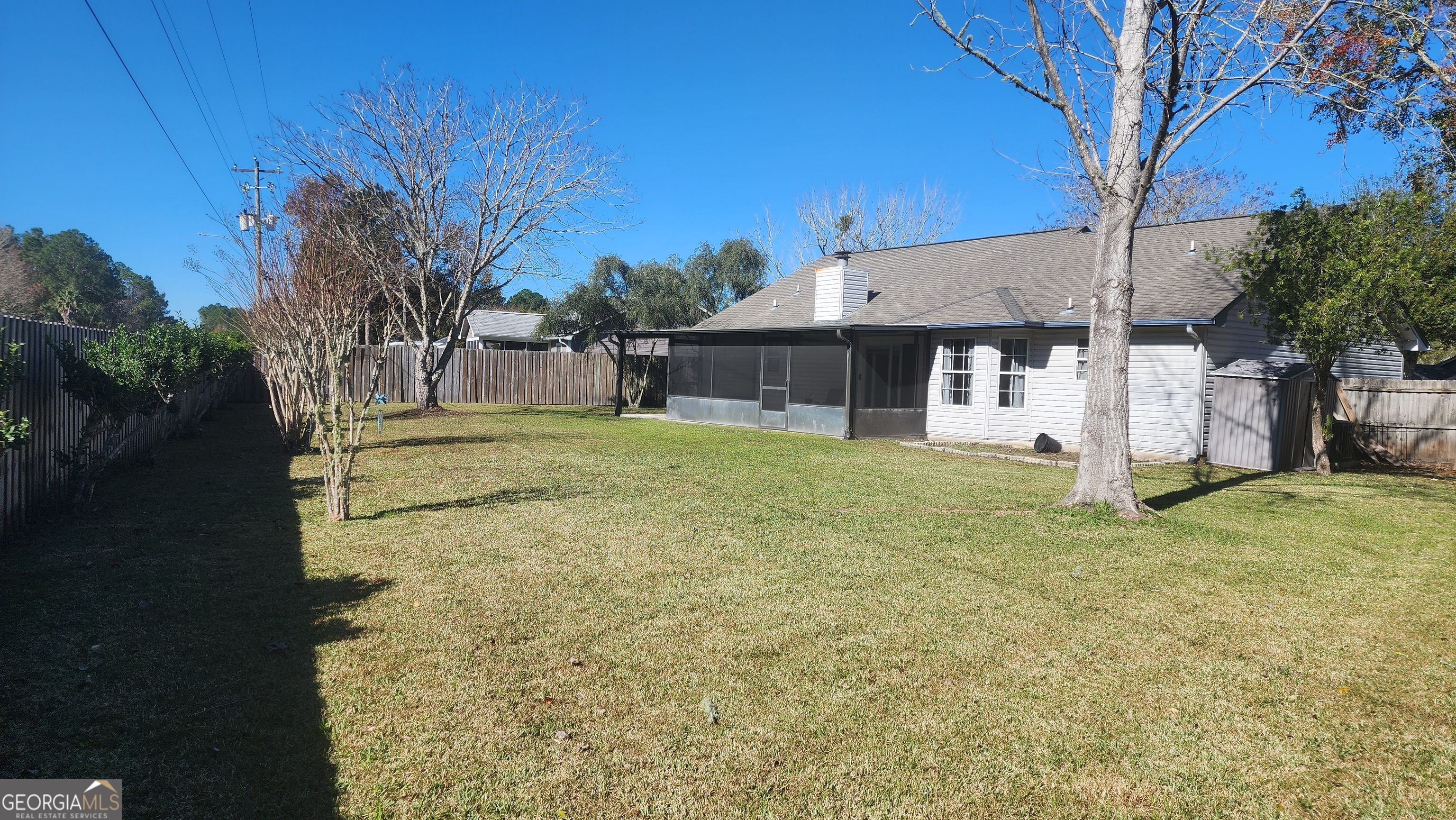 113 Almond Circle Kingsland, GA 31548 - Photo 7 of 34 a view of a house with a yard