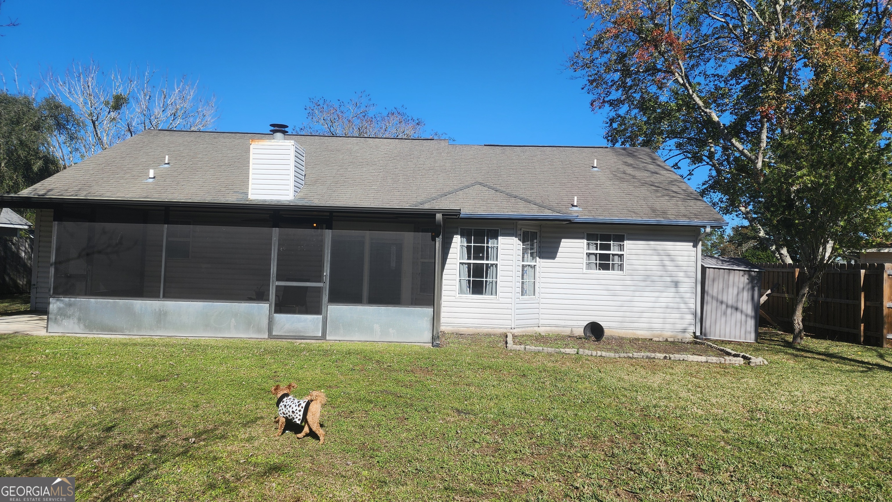 113 Almond Circle Kingsland, GA 31548 - Photo 8 of 34 a front view of a house with a yard