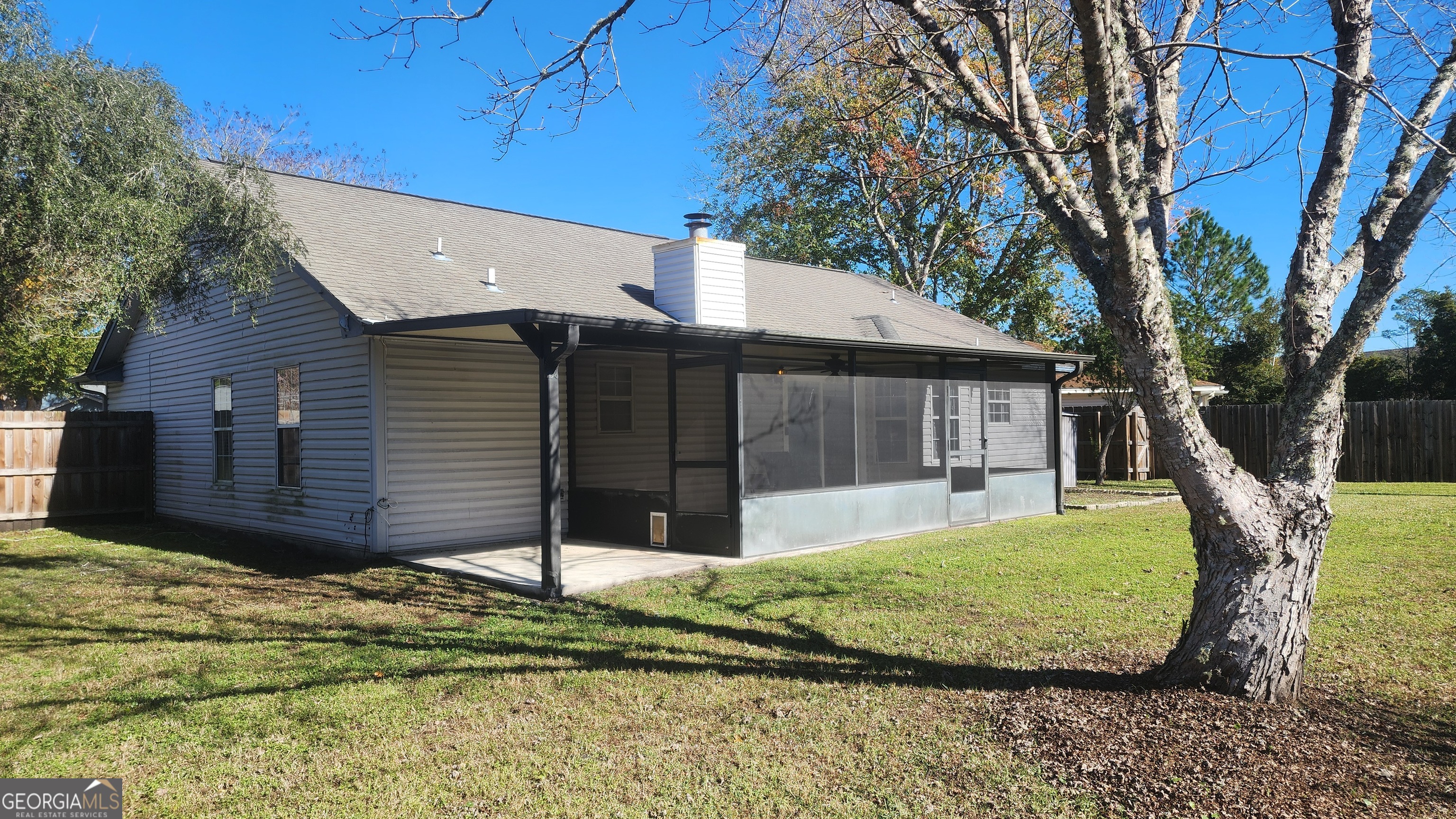 113 Almond Circle Kingsland, GA 31548 - Photo 9 of 34 a view of a house with a yard