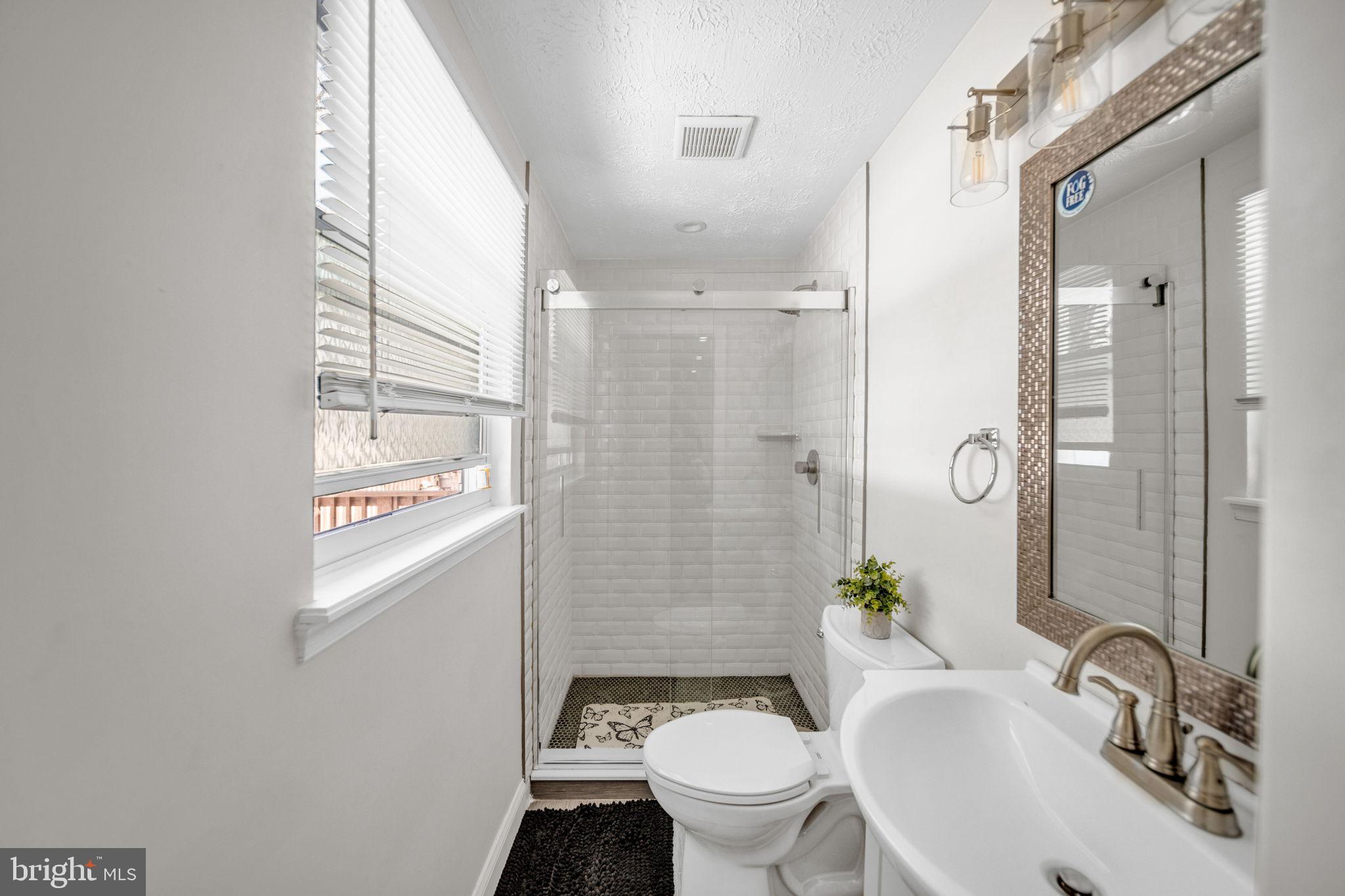6206 Clinton Way Clinton, MD 20735 - Photo 13 of 31 Bright and airy modern primary bathroom.