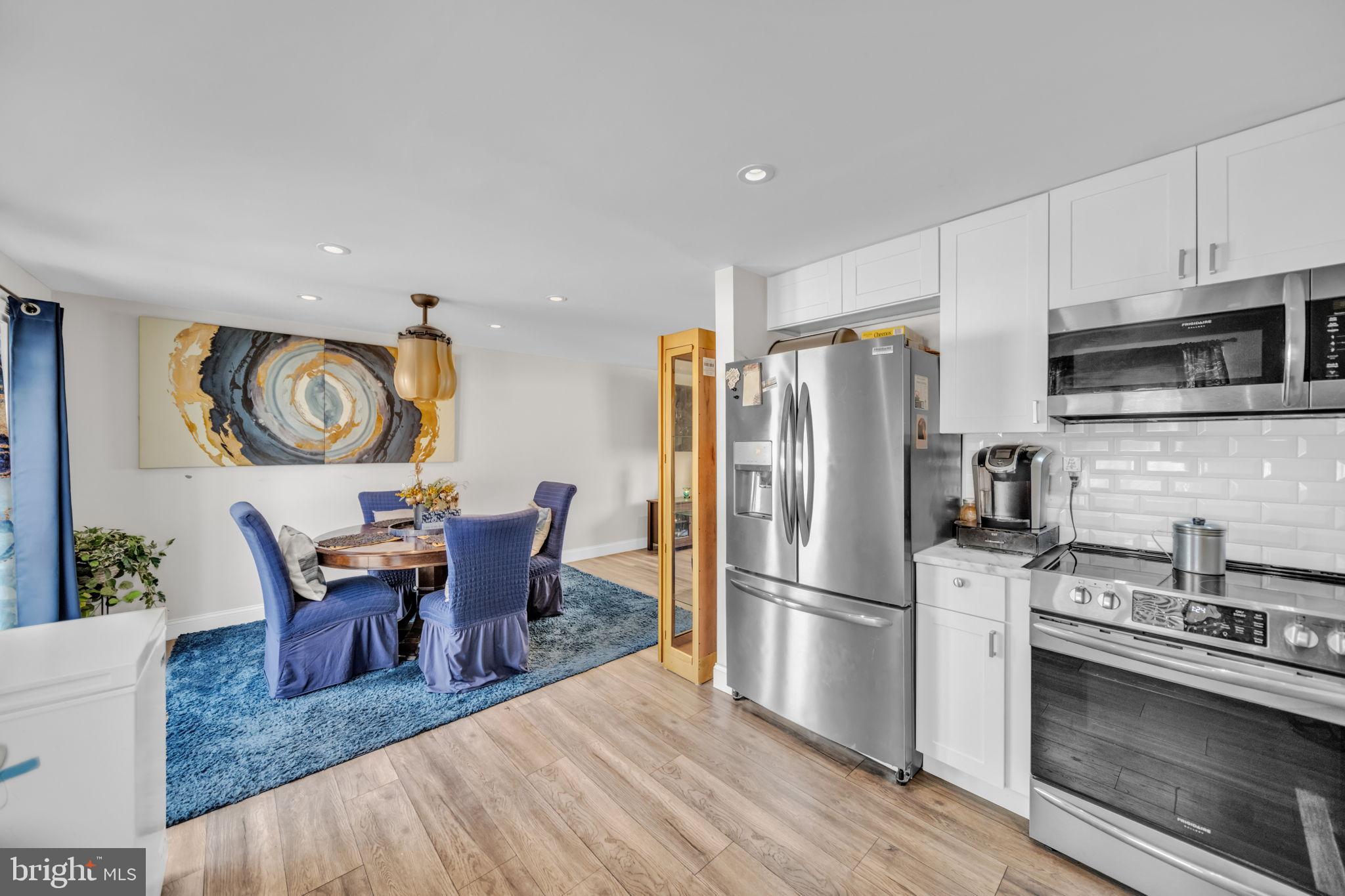 6206 Clinton Way Clinton, MD 20735 - Photo 10 of 31 Modern kitchen with dining area.