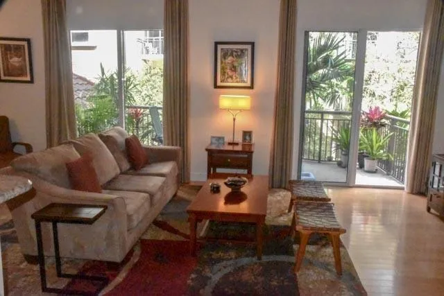 a living room with furniture and a window