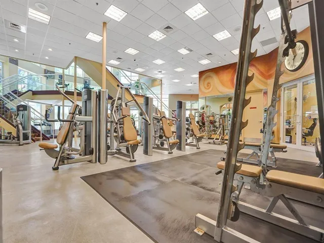 a living room with furniture fireplace and book shelf