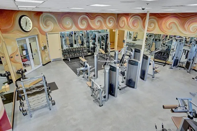 a view of a chairs and table in the patio